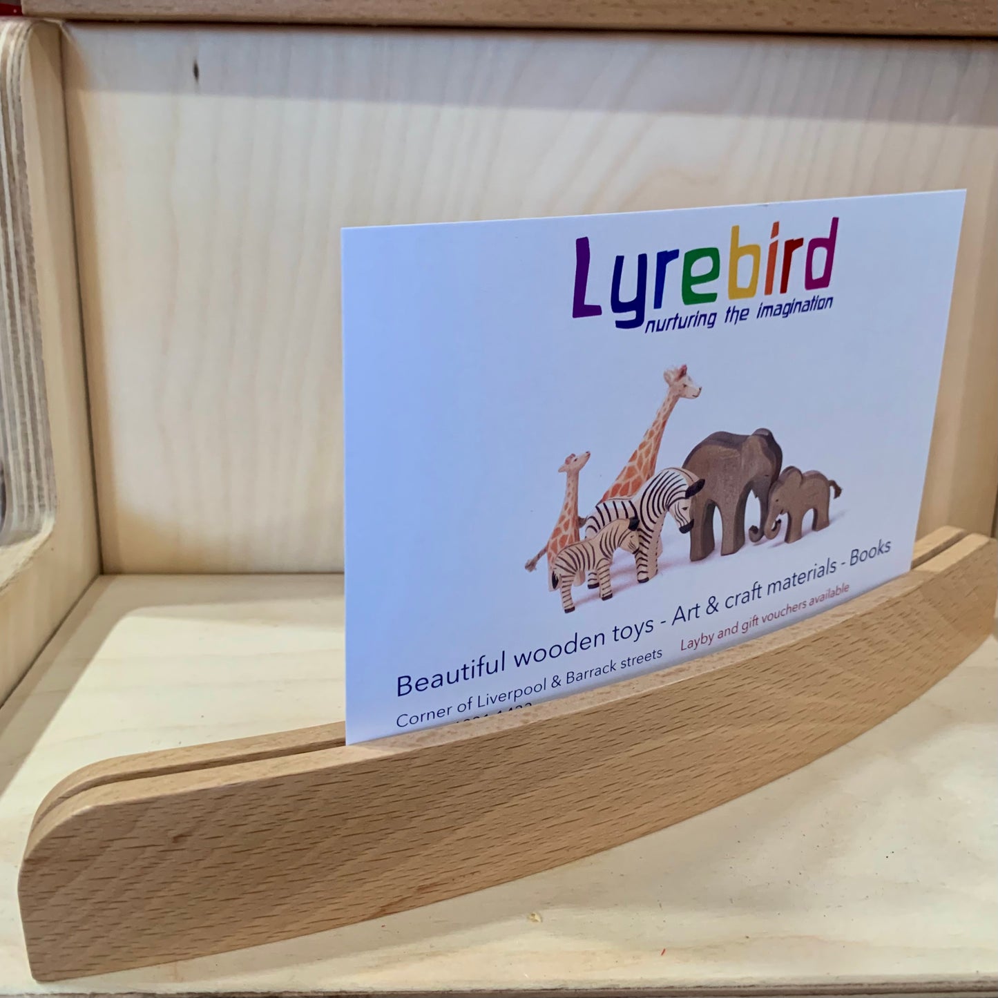 Curved post card stand 25cm