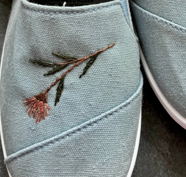 Australian native flower embroidered onto a canvas shoe by Juliette