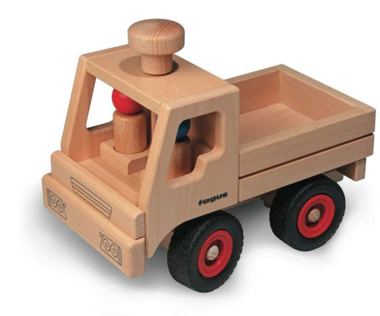 Wooden toy truck with black wheels and red axles on a white background