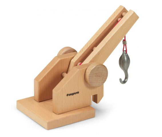 Wooden toy crane with a hook on a white background