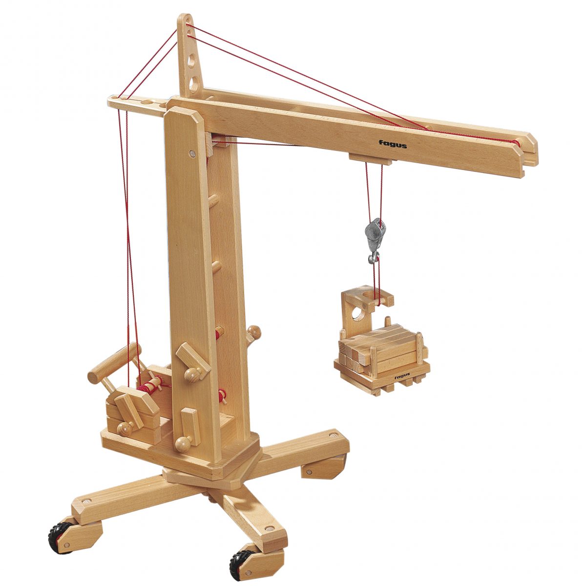 Wooden toy crane lifting cargo on a white background