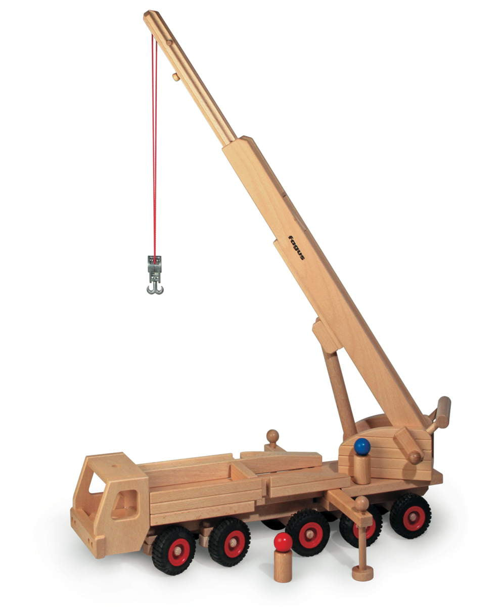Wooden toy crane truck with extending craneon a white background