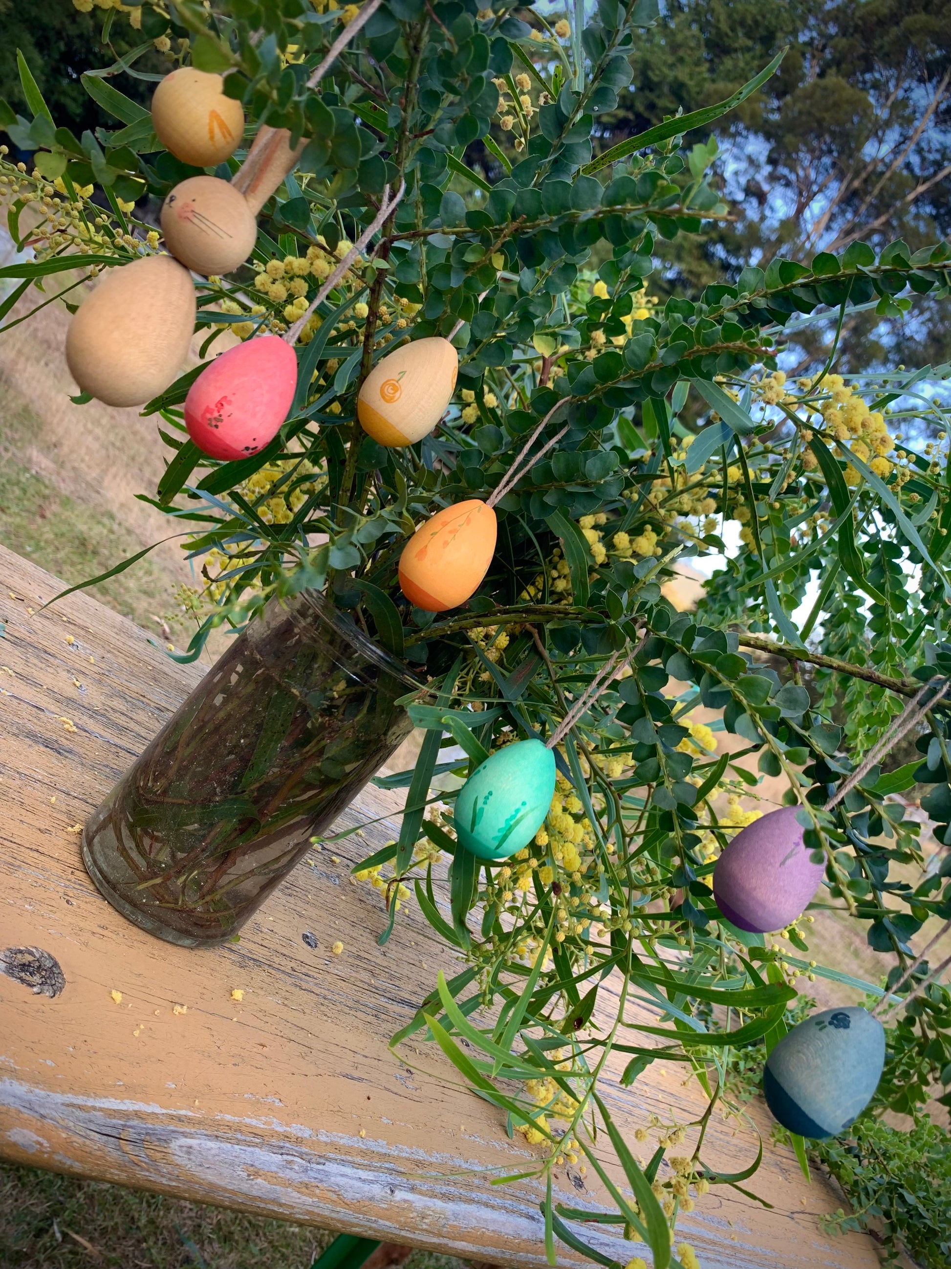 All three of Grapat Easter sets hanging together from a tree branch in a jar ready to display on the Nature table