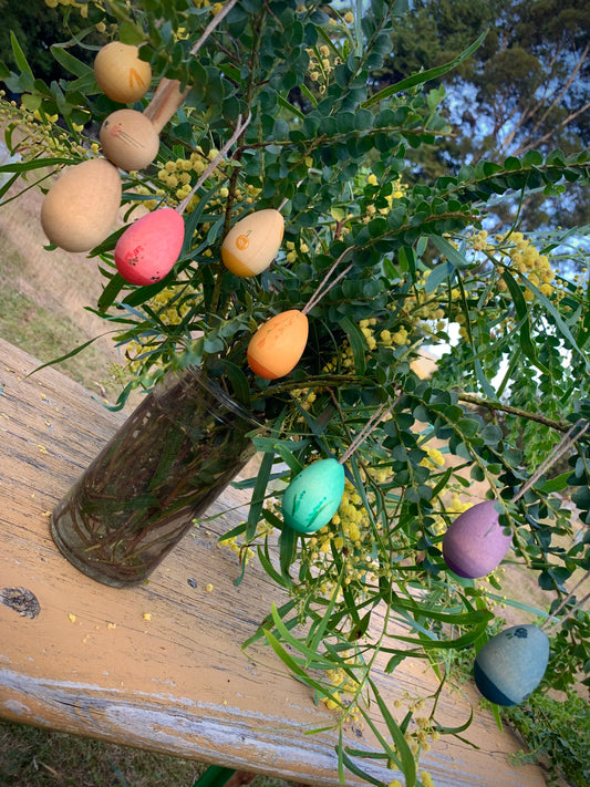 All three of Grapat Easter sets hanging together from a tree branch in a jar ready to display on the Nature table
