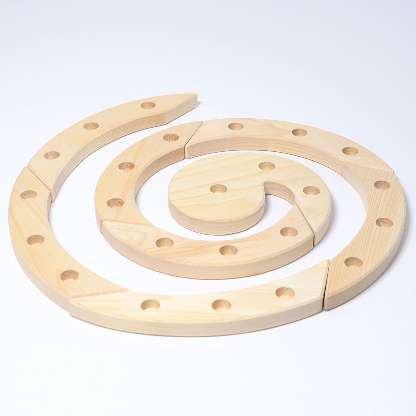 Wooden celebration spiral on a white background