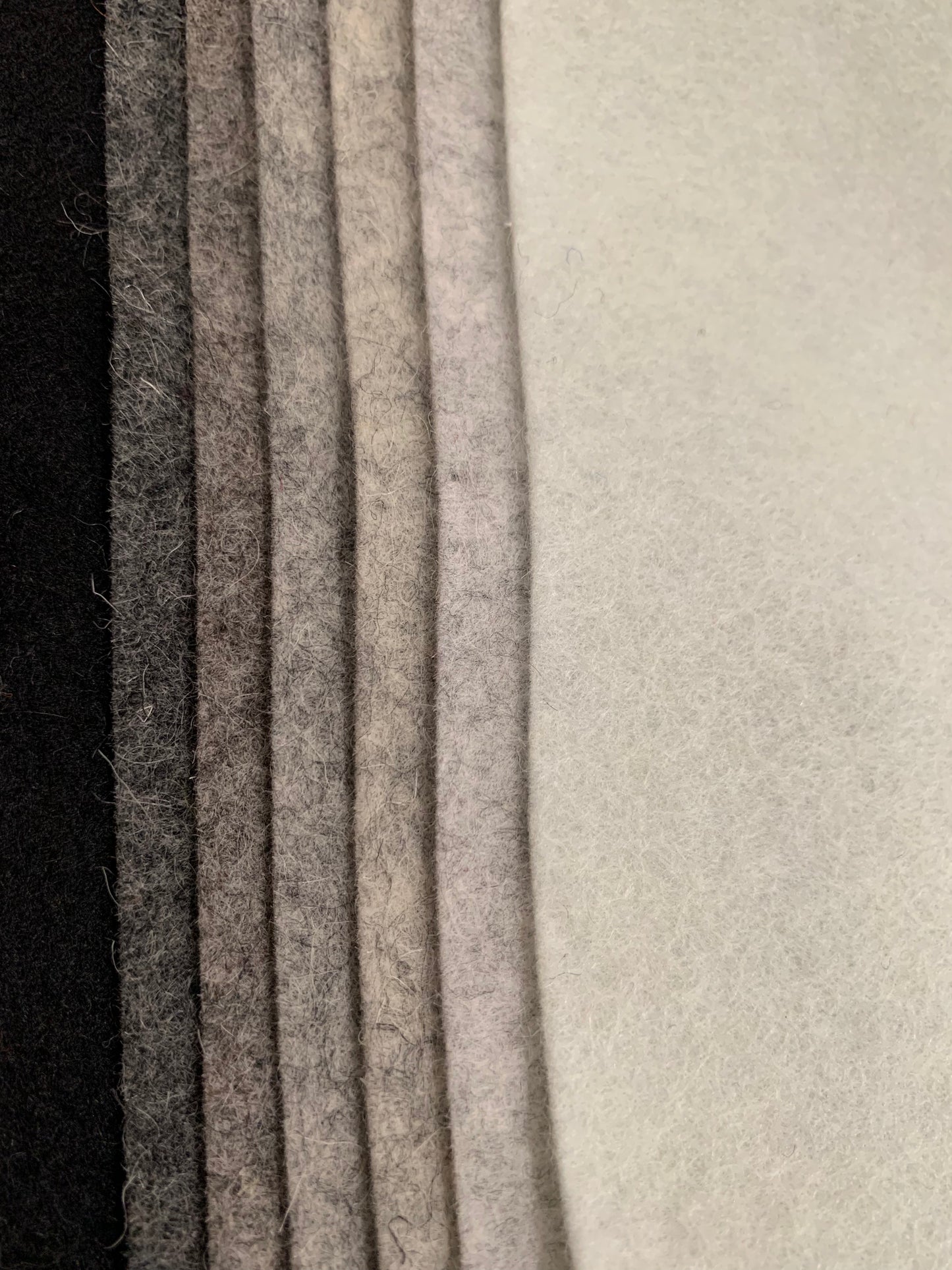 Seven shades of Dutch woll felt in mottled grey tones