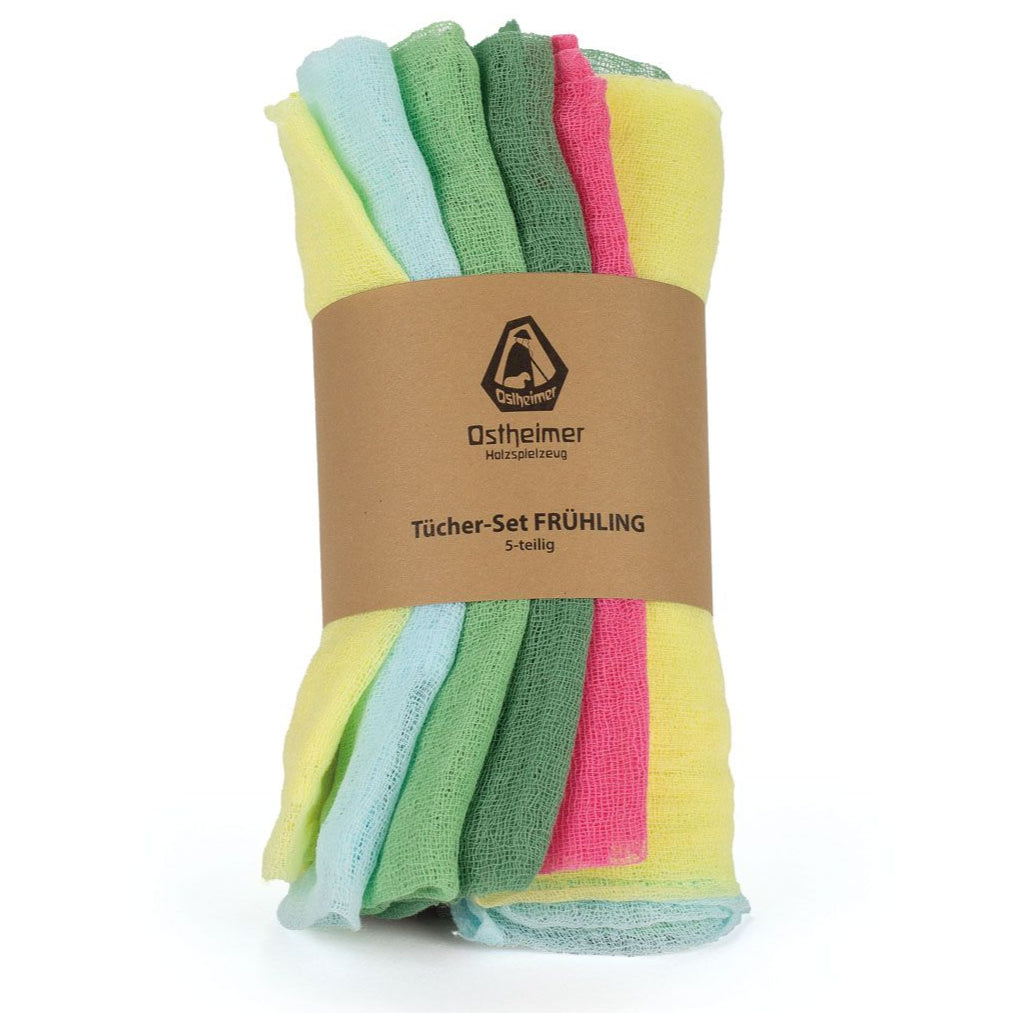 Set of colorful Spring fabric cloths with a branded label on a white background