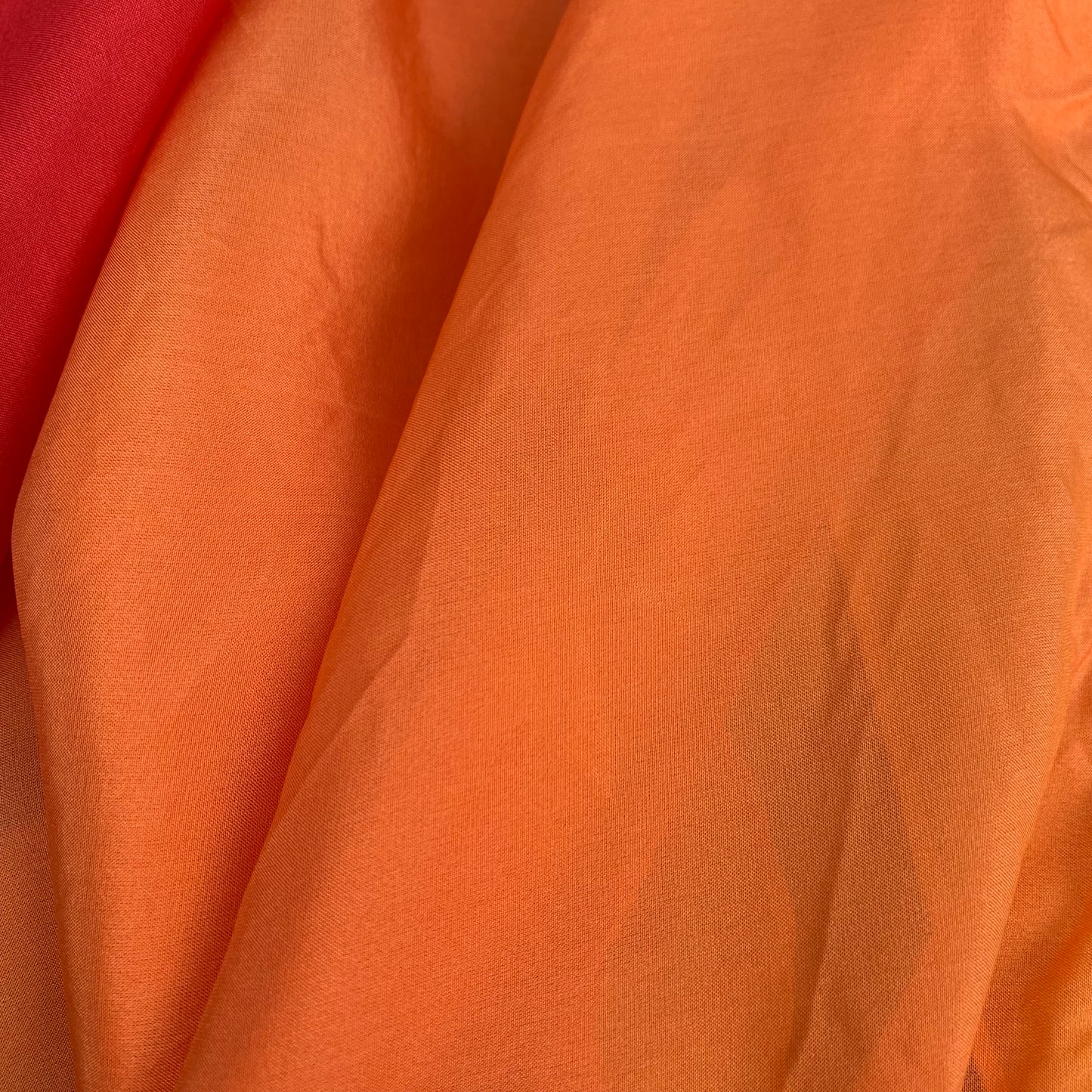Close-up of orange silk fabric