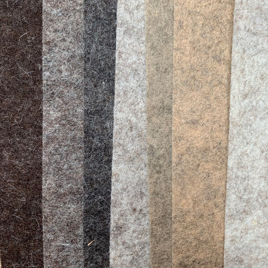 Mottled brown wool felt in seven shades from darkest to lightest brown