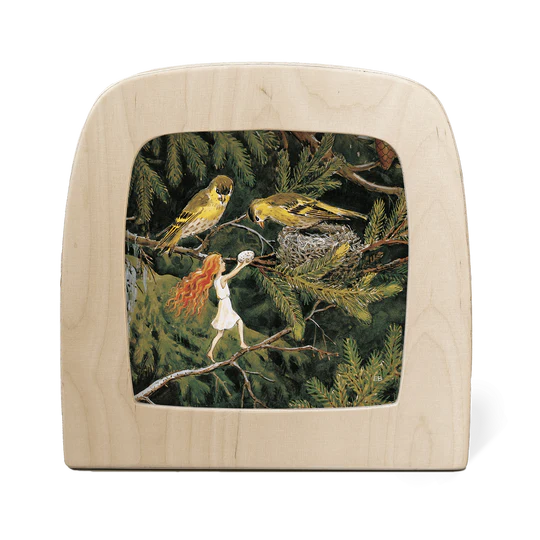 A fairy with long red hair playing with two birds in a tree