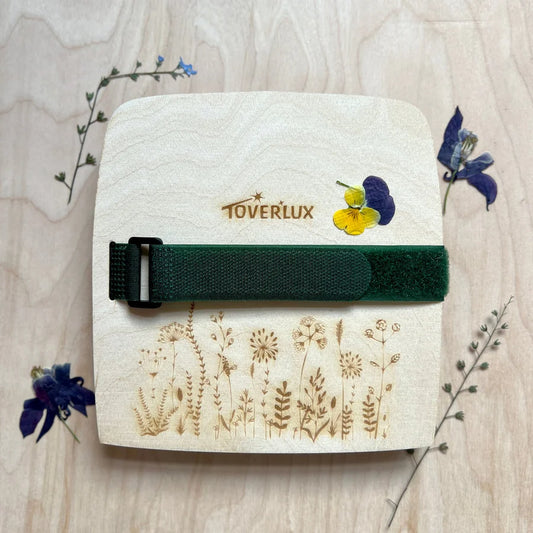 flower press with a clever velcro fastner, top features beautiful embossed floral art and branding