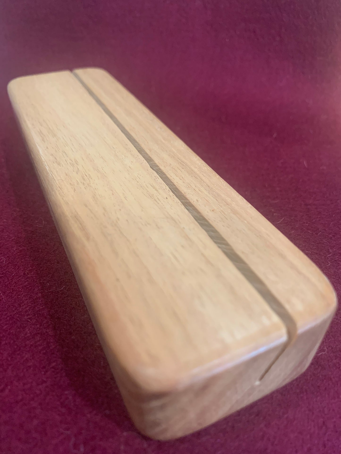 Wooden post card stand for displaying art work on a Steiner nature table