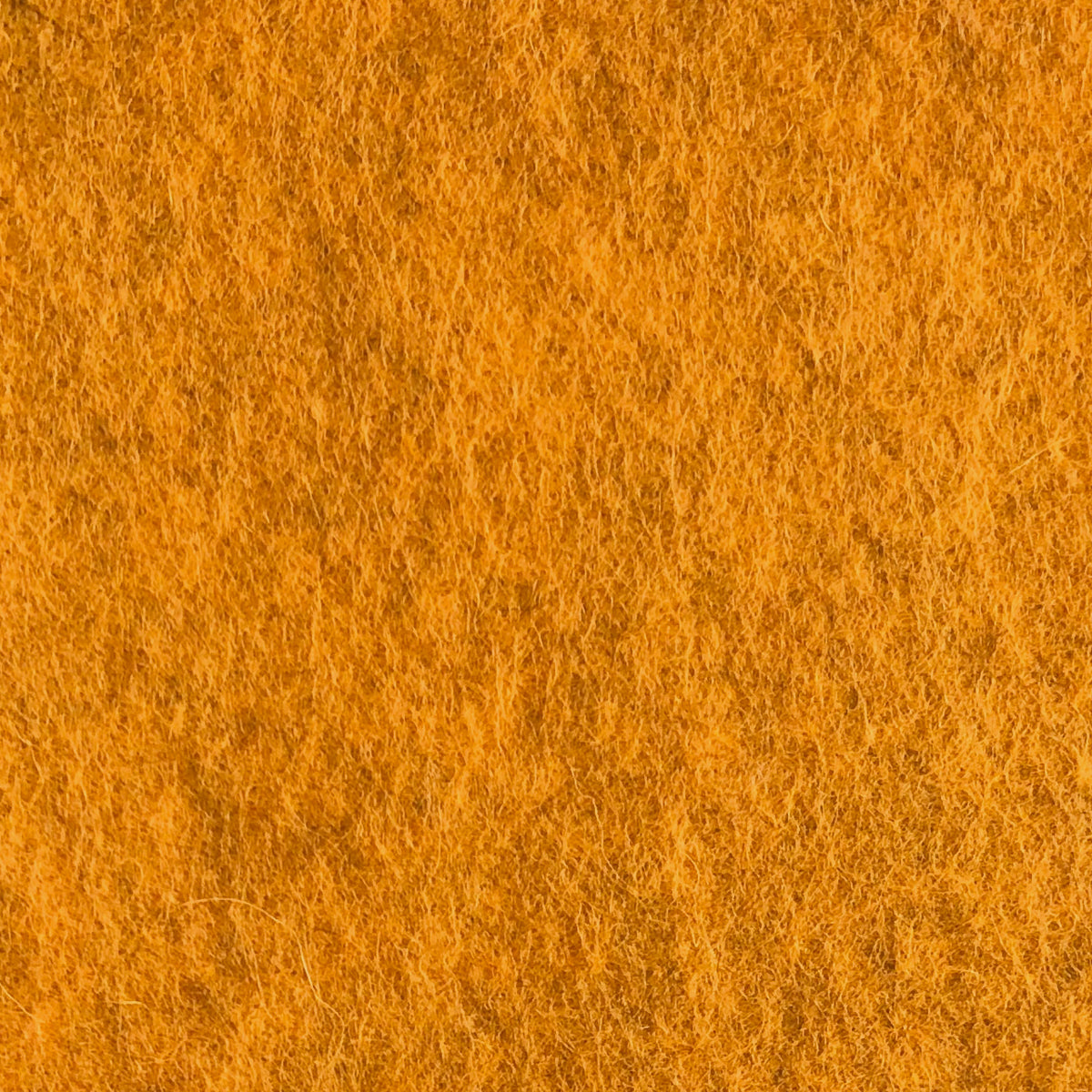grey mottled wool felt with orange tint