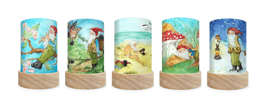 Five delightful lantern shades of a little gnome with a red hat in a variety seasonal
