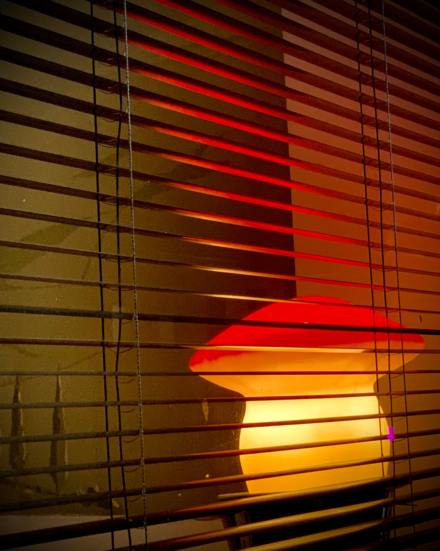 medium red terracotta lamp lit up