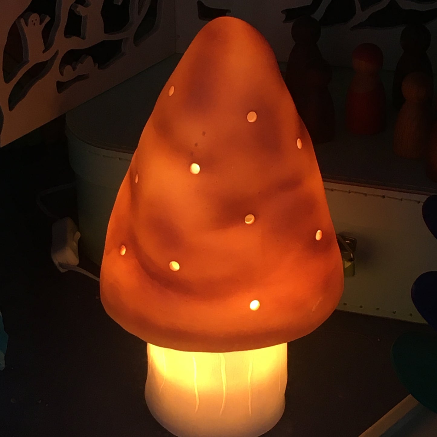 red small mushroom lamp lit up