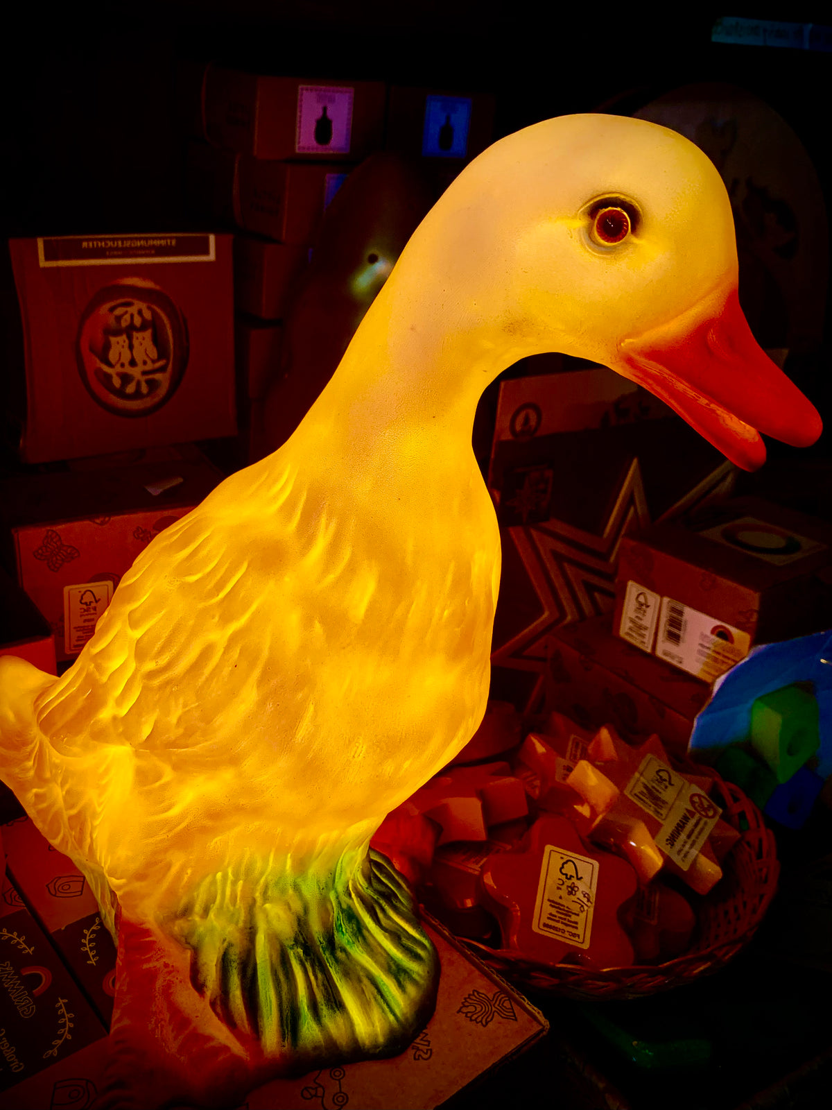 Life sized Heico Duck lamp turned on at night 
