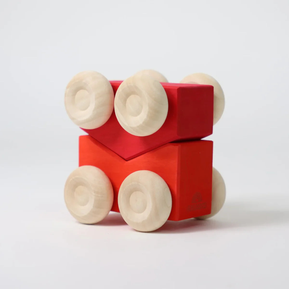 Red wooden stacking cars with wooden wheels on a white background