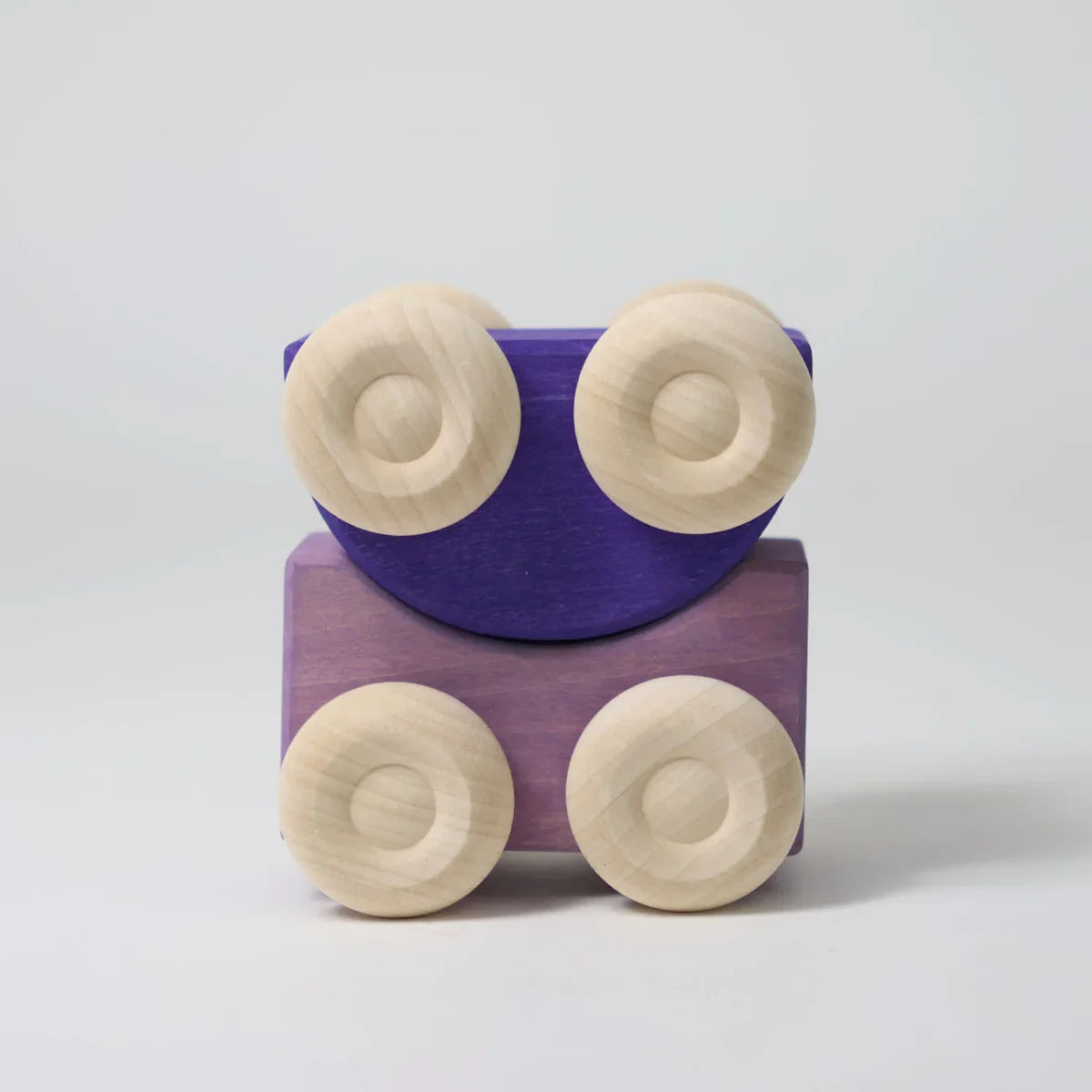 Purple stacked pair of Wooden toy cars with wooden wheels on a light grey background