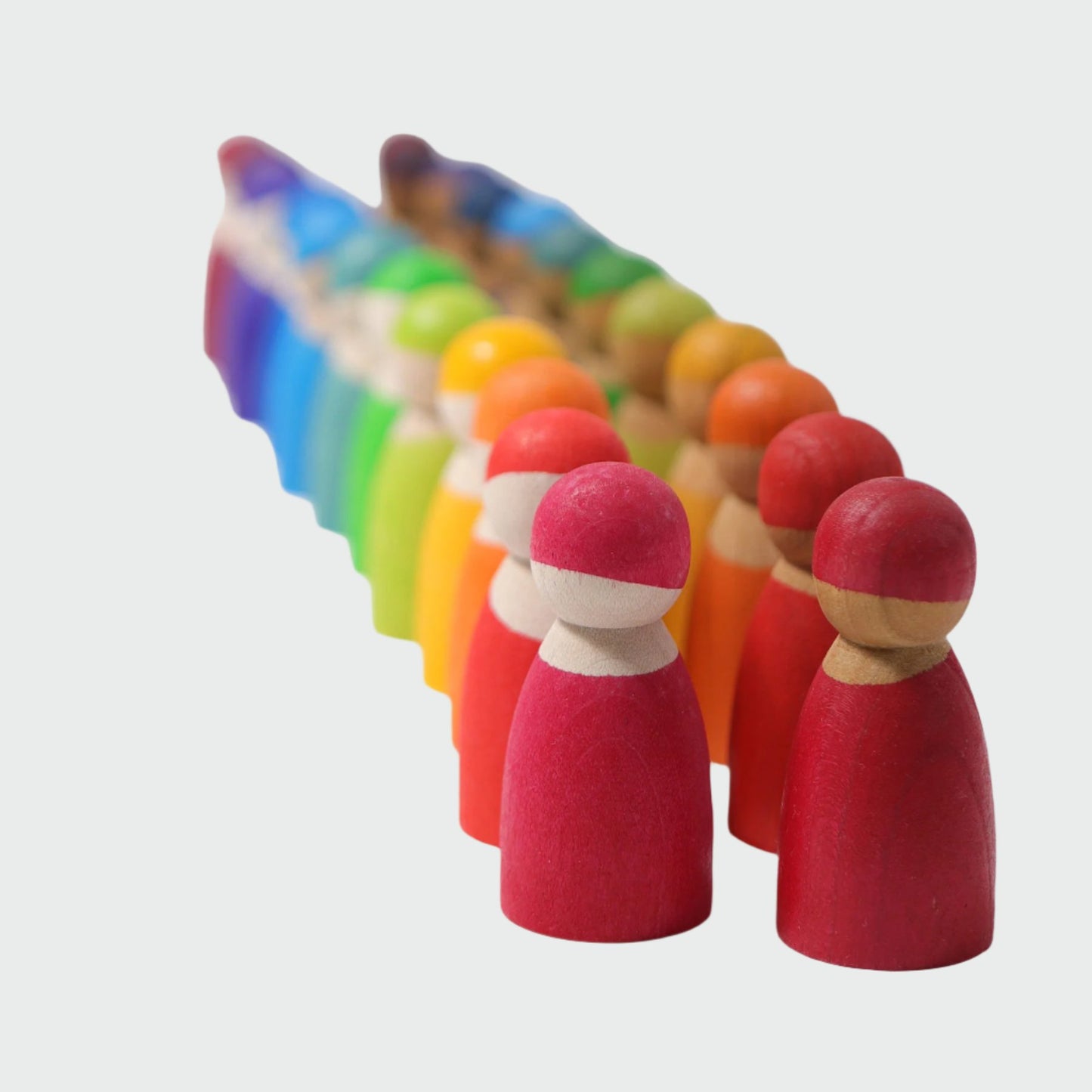 bright coloured peg people by Grimms