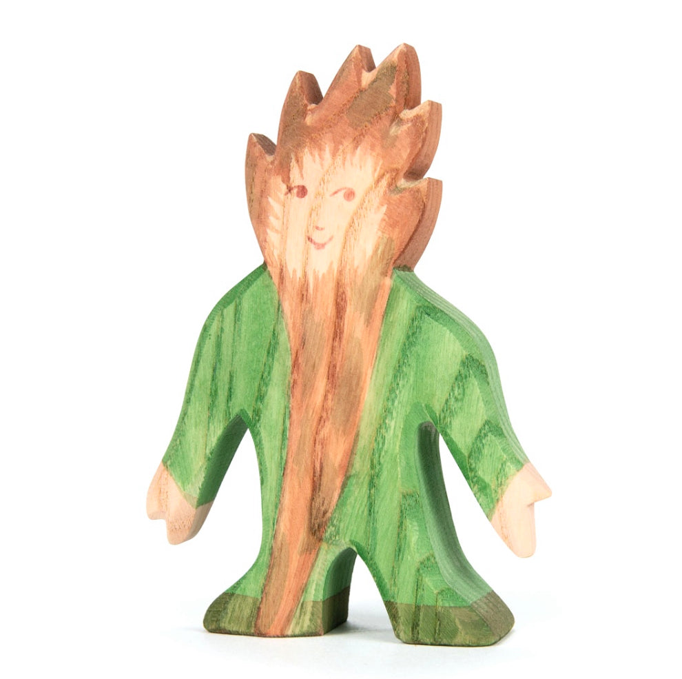 Wooden figurine of a troll character with a green body and brown hairt and long beard on a white background