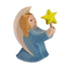Blue wooden Angel figurine with a rocking base holding a star 