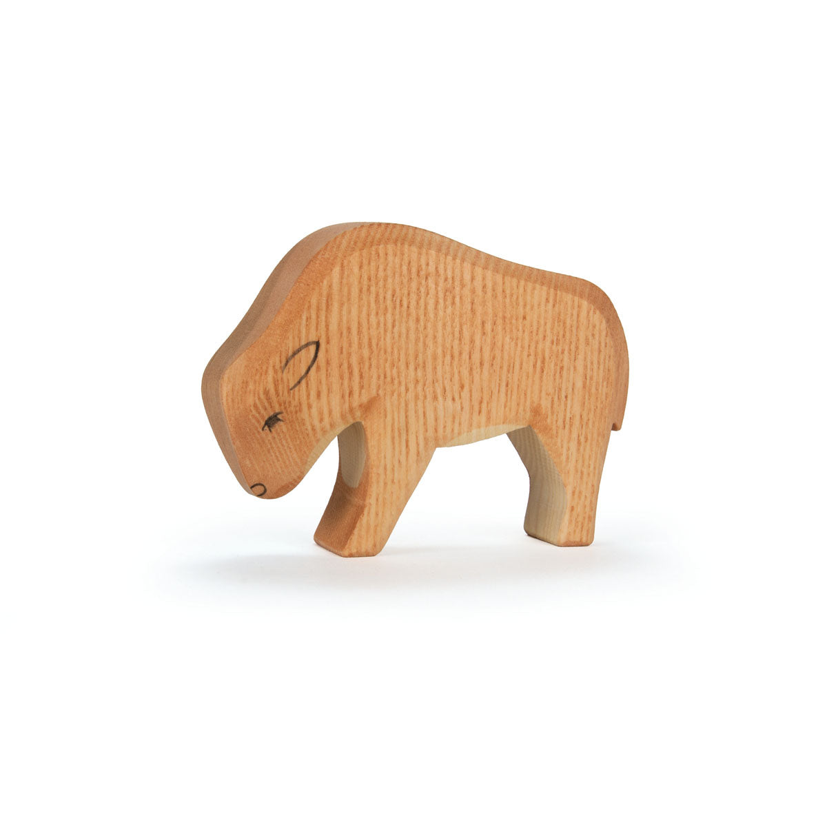 Wooden buffalo figure on a white background