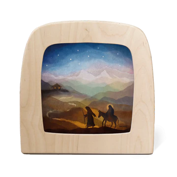 Wooden picture frame with a scenic landscape and Joseph leading Mary on a donkey