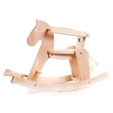 Wooden rocking horse with a toddler saftey support on a white background